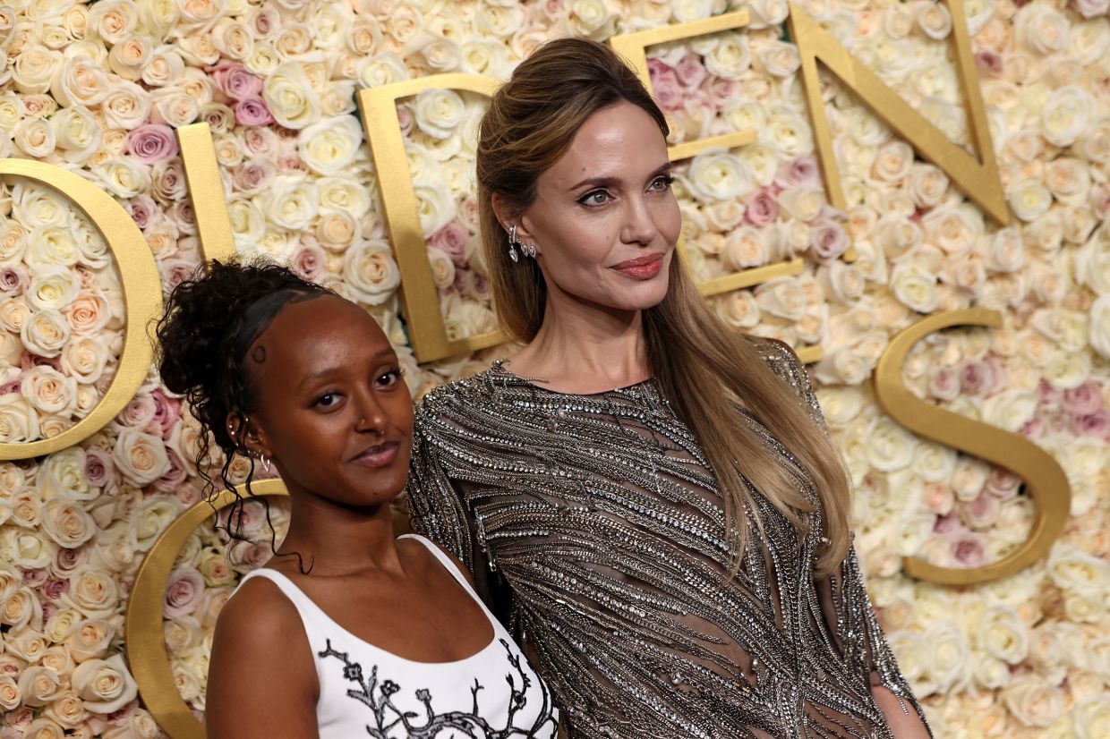 Angelina Jolie (right) and her daughter Zahara Jolie/ Photo: TNS