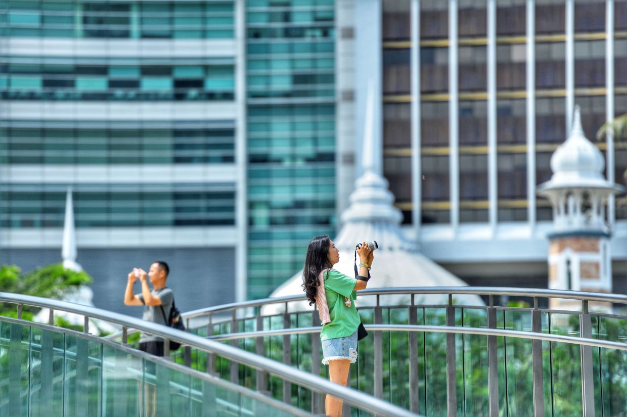 The Yuet Wan Cantonese Opera Association’s 60-minute showcase this Saturday on the Masjid Jamek bridge will be a free-seating event, with audiences advised to dress comfortably and be prepared for the weather. Photo: The Star/Raja Faisal Hishan 