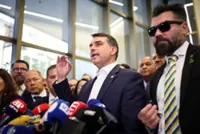 Senator Bolsonaro says he met with disgraced Brazilian banker after arrest