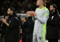 Soccer-Guardiola deflects future talk saying no decision has been made after title dreams dashed