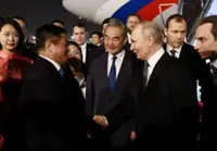 Putin lands in China for trip that aims to show unshakeable ties after Trump pomp