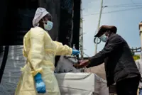 Malaysia tightens Ebola watch after WHO global alert