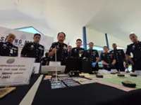 Nine nabbed after MyKad scam leads Sabah cops to forged IC ring