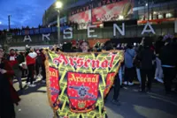 Soccer-Celebrations erupt in North London after Arsenal seal Premier League title