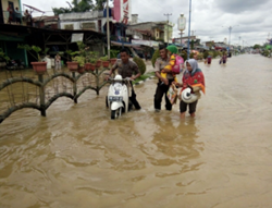 Indonesia’s Riau ready to evacuate residents from flooding areas after fighting forest fires