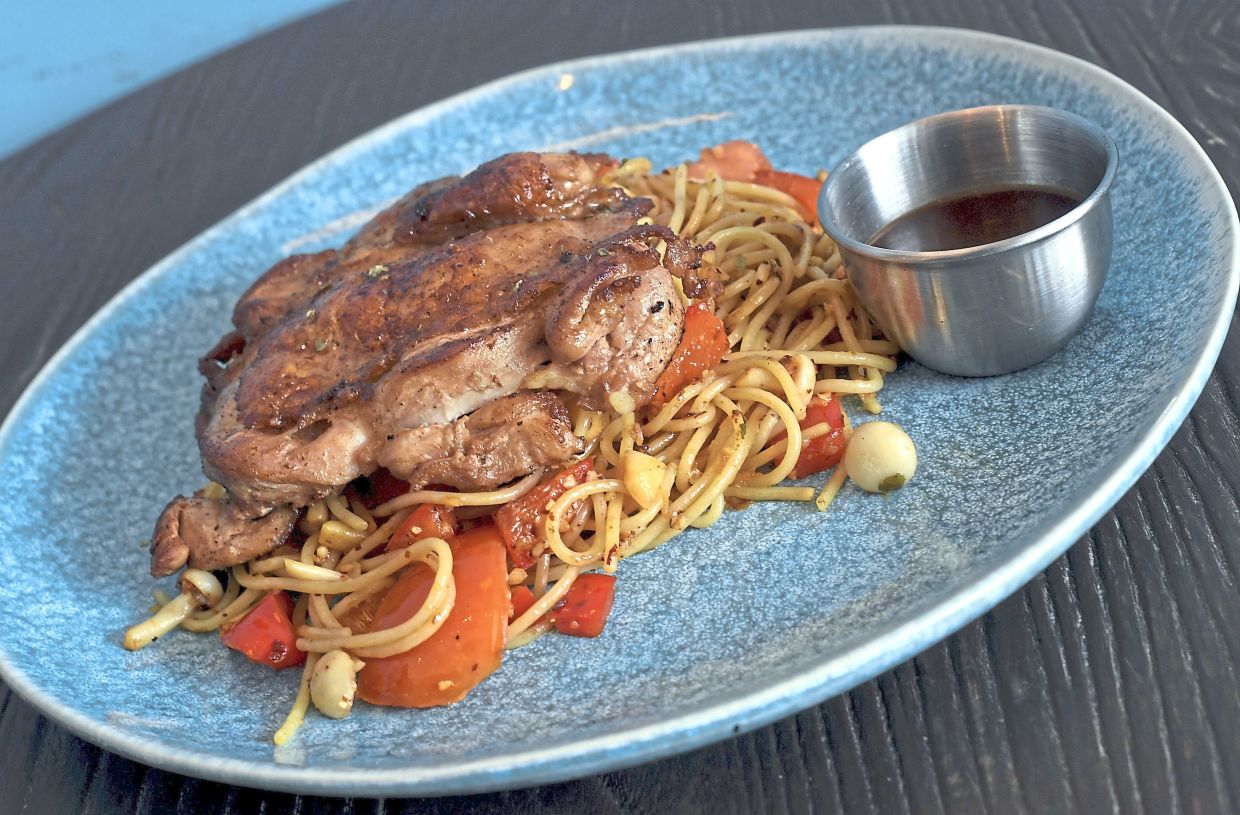 Aglio Olio with Grilled Chicken Chop at The Bear Hug cafe in Subang Jaya.