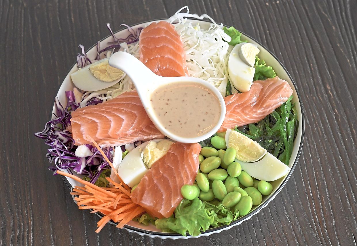 Poke Salad with Salmon is a healthy choice on the menu.