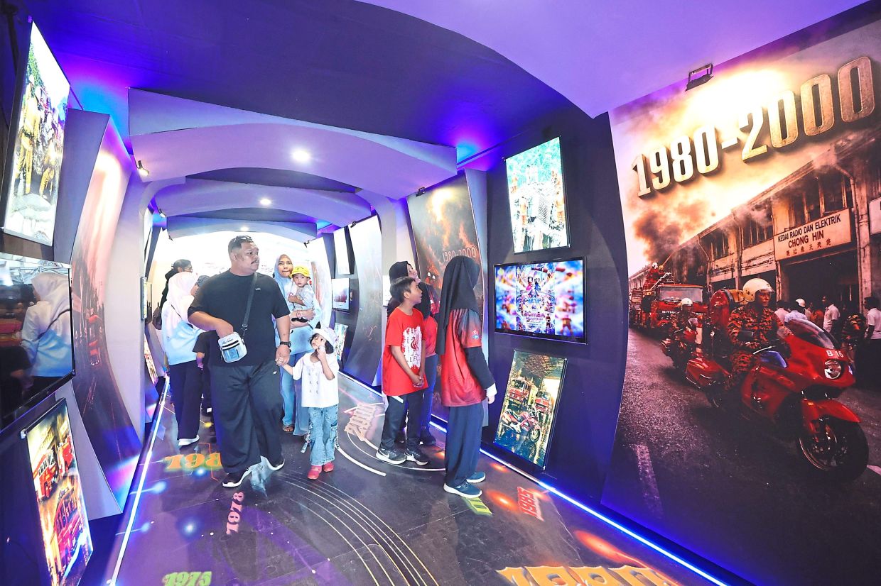 Visitors at an exhibition highlighting the history of the country’s Fire and Rescue Department.