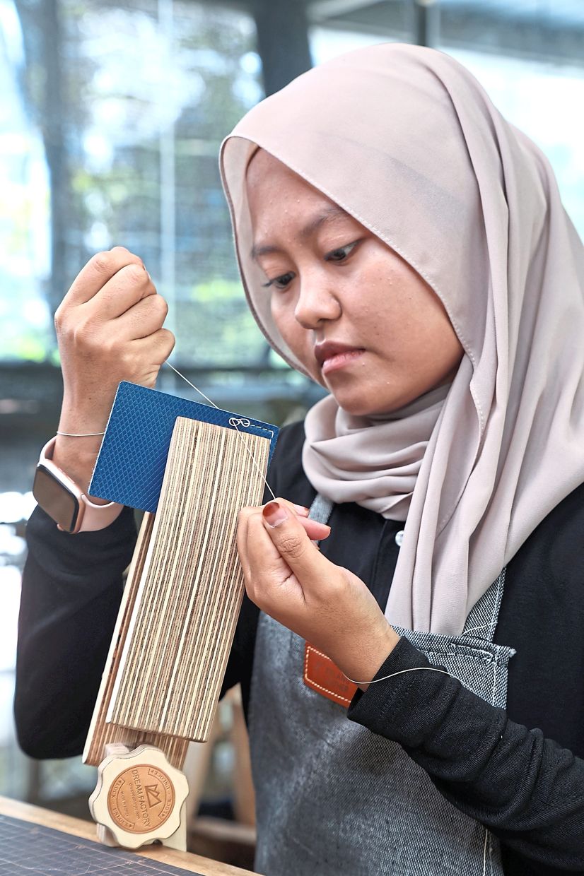 Ida says working on a leather bag is a form of stress relief and mental stimulation for her.