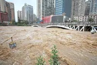 Over 20 dead in historic downpour