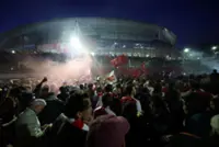 Soccer-From near-misses to glory, Arsenal fan says title and scenes of celebration feel surreal
