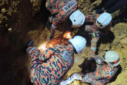 Two men killed after riverbank collapses, believed to have been gold mining