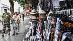 Tourists in Thailand plan for coming cuts to visa-free stays