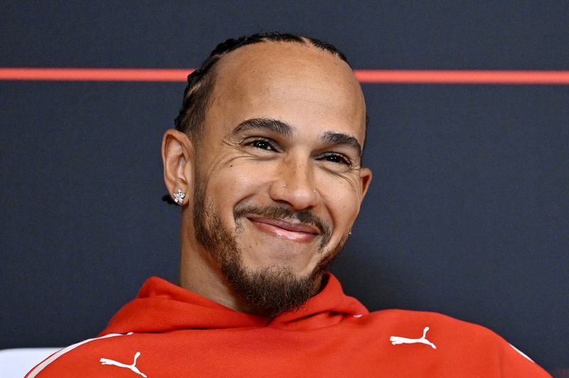 Ram Hamilton Motorsport: Motor racing-Hamilton sheds tear over Arsenal title as ...