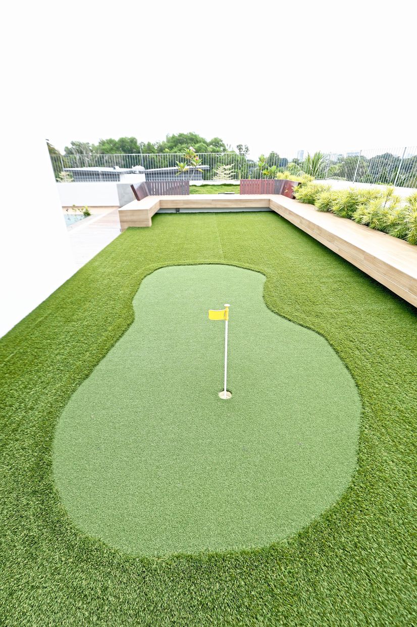 Enjoy the golden hour and some mini golf on the rooftop.