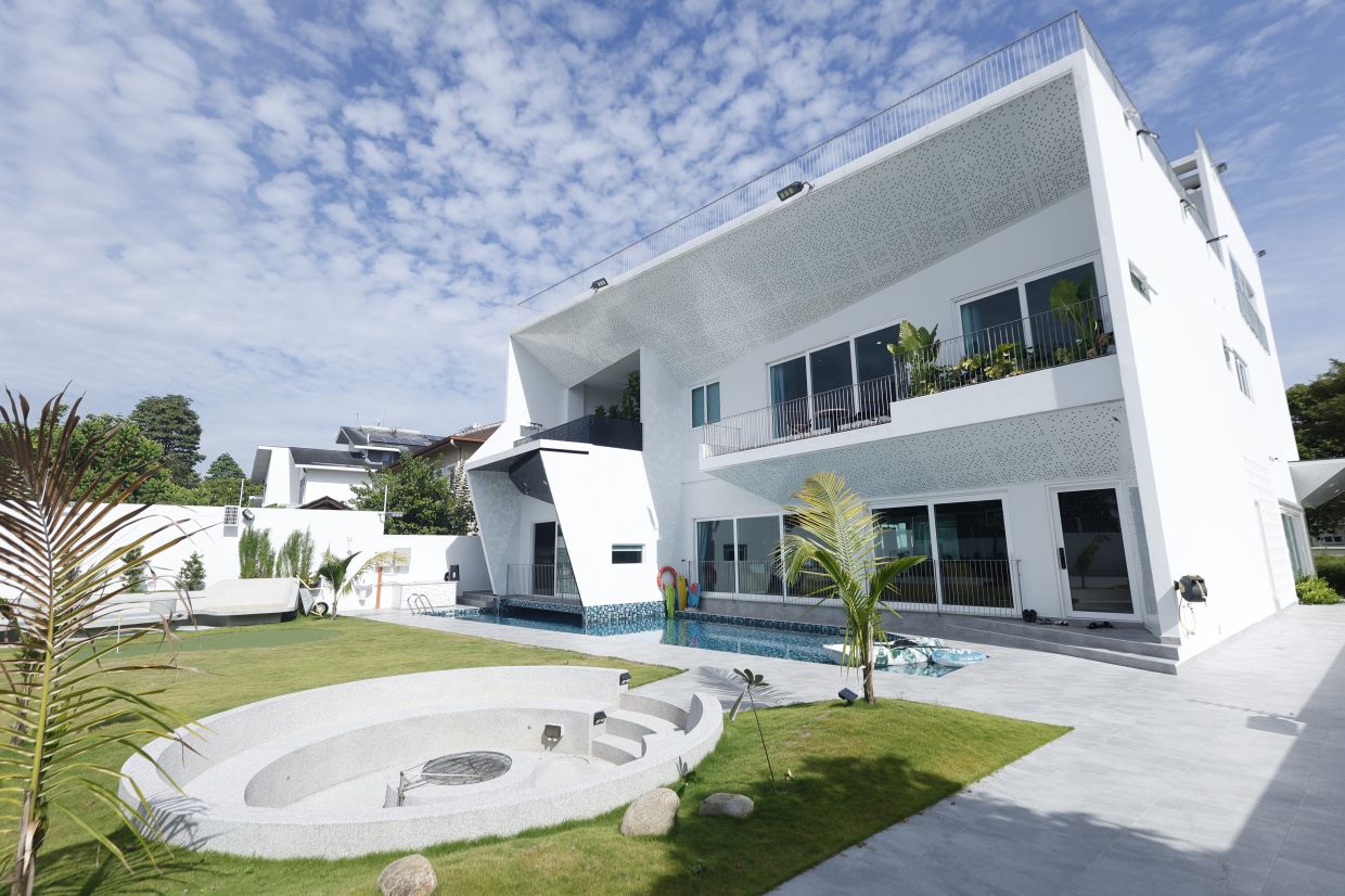 The house is a masterclass in layout, perfectly splitting three floors into private, secure retreats and open spaces made for get-togethers.
