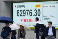 Japan's Nikkei rallies to record close as AI shares shine