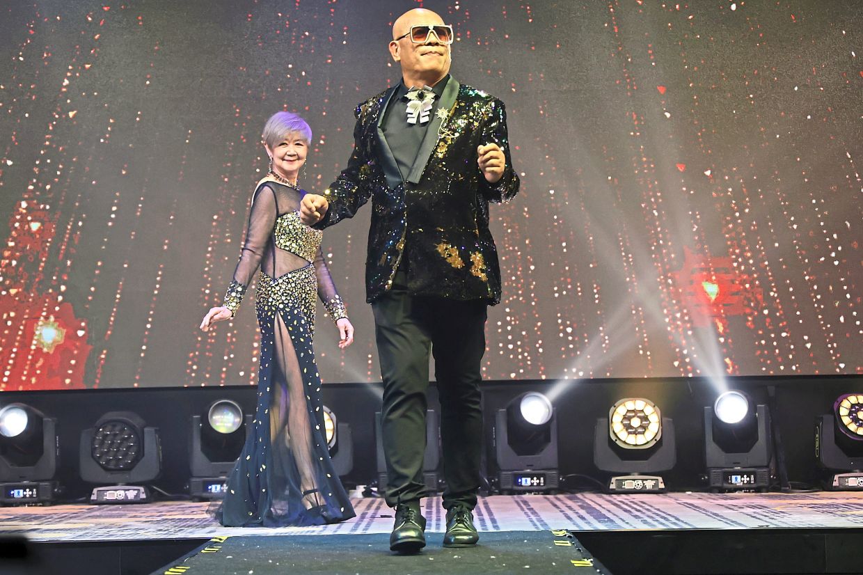 Senior couples commanding the stage with their poise and elegance during the fashion show that was a highlight of the Glamparents Showtime. ( May 10, 2026 ) —CHAN BOON KAI/The Star