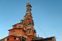 Villager’s madcap 10-storey home demolished