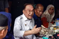 Move forward with compassion, reject divisive politics, says Anwar