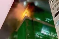One dead, four injured as Hong Kong subdivided flat fire forces 300 to be evacuated