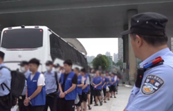 Lao police hand over 494 fraud suspects to China