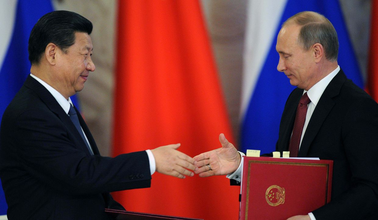This marks the first time China has hosted the leaders of Russia and the US in the same month outside a multilateral setting.