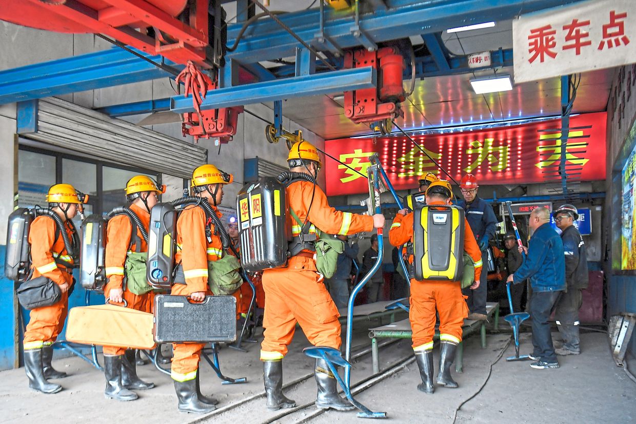 Race against time: Rescue workers preparing to descend into the coal mine in the aftermath of the explosion at Changzhi city’s Liushenyu coal mine in Qinyuan county, Shanxi province. — Xinhua via AP