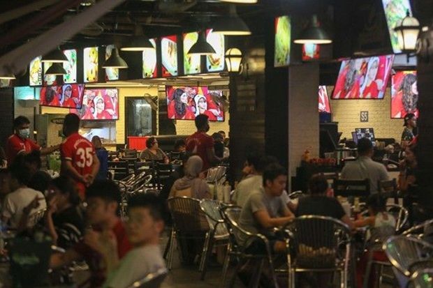 Mamak restaurants are popular match-night spots where fans gather over food to watch the big game. — IZZRAFIQ ALIAS/The Star