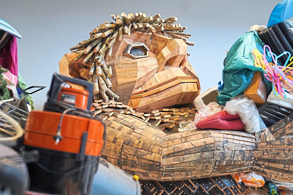 Each of Dambo’s trolls has a unique name and design. In the museum exhibit, his new works are based on friends he had when growing up. Photo: AP