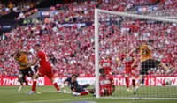 Soccer-McBurnie winner sends Hull City back to Premier League