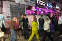 Cambodian authorities raid two riverside 'adult entertainment' bars, rescue 35 victims, detain one suspect