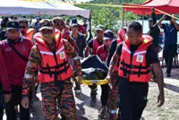 Friends devastated after failing to save siblings swept away in river