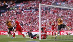 Soccer-Hull back in Premier League after McBurnie's last-gasp playoff winner
