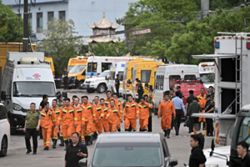 China revises death toll from mine accident to 82 from 90