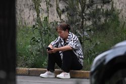 Anxious families await news of missing in China’s worst mining disaster in 16 years