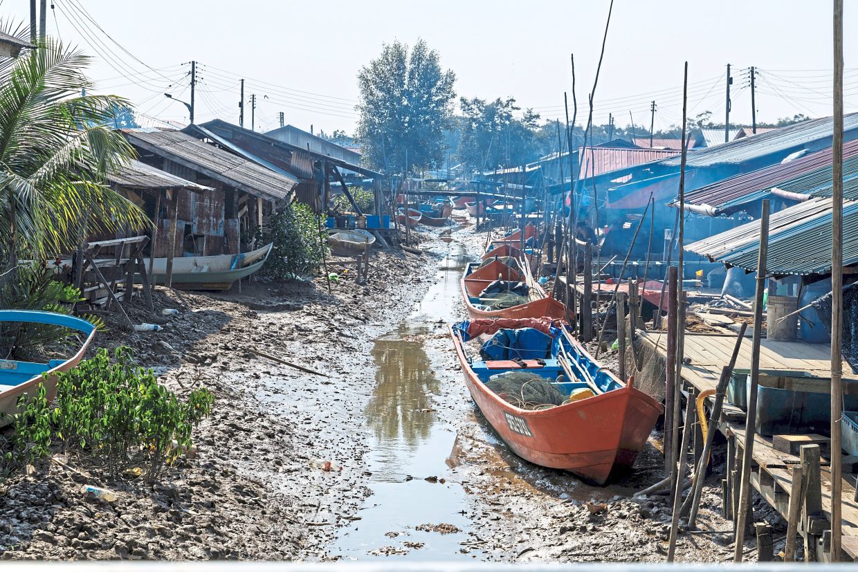 Fishing boats at Kampung Penipah, a village known for its ‘ikan lumek salai’.