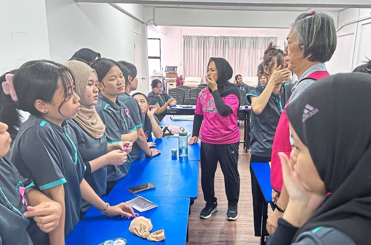 Trainees undergo caregiving lessons as part of CarersPlus Asia’s structured training programme.