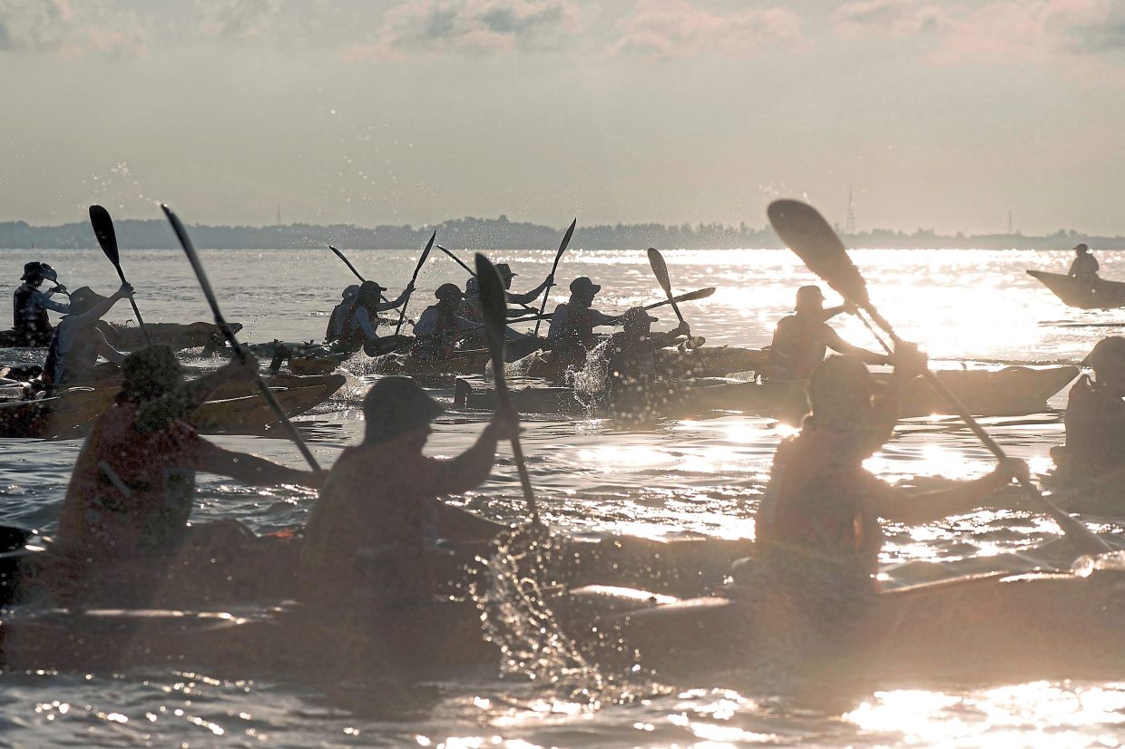 Athletes competing in the Round Island Kayak Challenge.