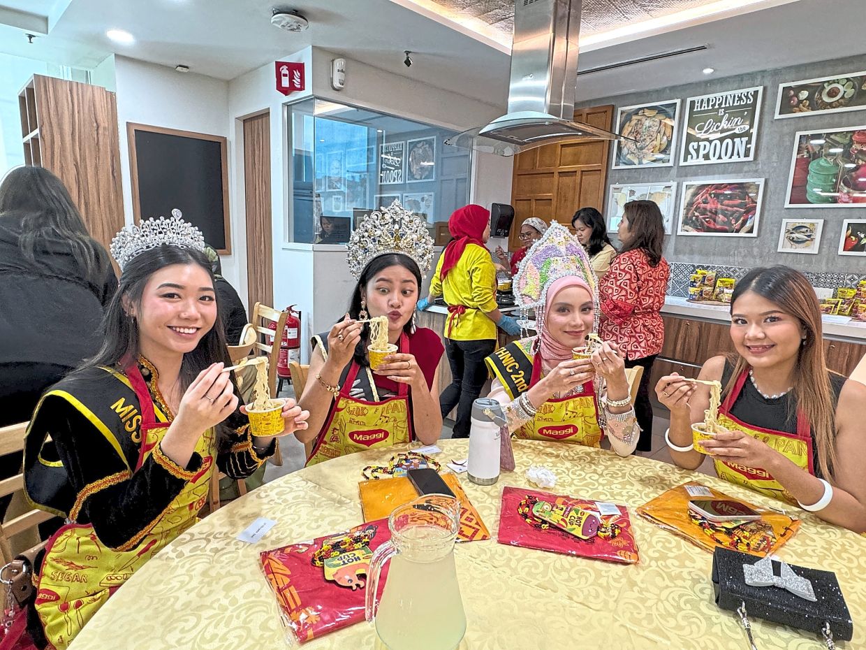 Miss Ethnic Borneo Native Festival pageant contestants (from left) Lerrishea Tan, Diamond Pang, Emeraazwa Emeraldi and Daniellyn Izabel Tan adding glamour to the cooking event.