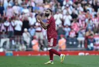 Soccer-King Salah signs off with assist in emotional Liverpool swansong