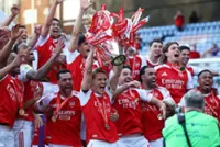 Soccer-West Ham relegated, Arsenal lift Premier League trophy on emotional final day