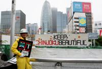 Japanese security guard finds fame as designer of duct tape signs​