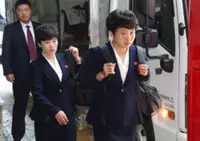 Stony-faced North Korean women’s team leaves South Korea after title win
