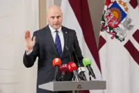 Latvia lawmaker Kulbergs says he will form four-party government