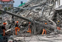 Philippine authorities probe cause of Angeles City building collapse