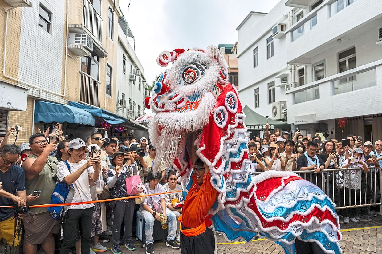 Thousands gathered on Hong Kong’s outlying island of Cheung Chau for its iconic bun festival, a long-running tradition centred on prayers for peace and blessings.