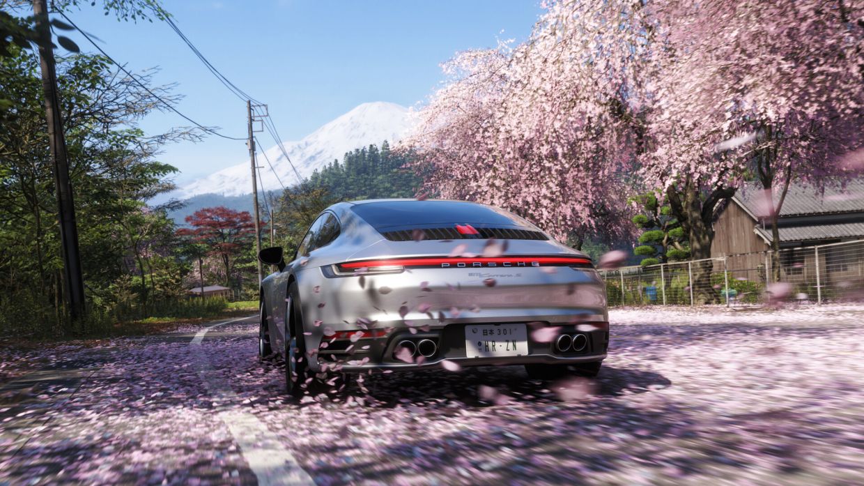The environment and driving conditions change as summer turns to fall and snow begins falling in winter before spring returns again. — Playground Games