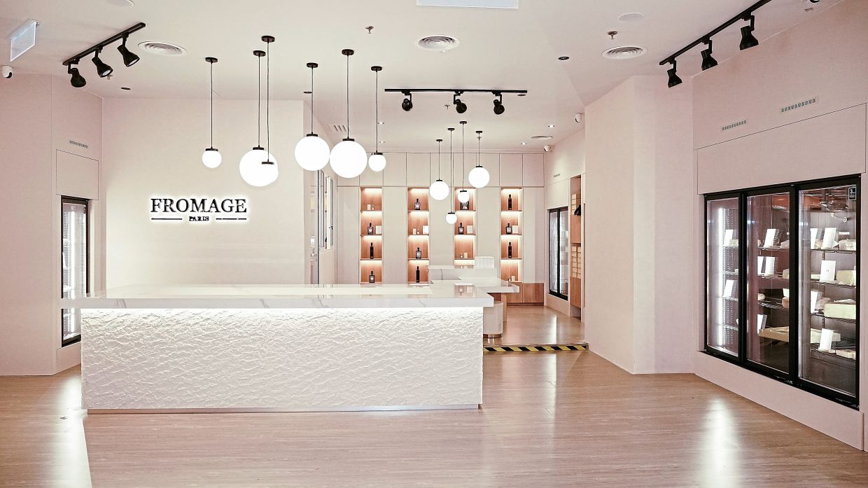 The shop boasts a huge island counter where Chekali and his team typically cut different kinds of cheese for tasting so that people can sample the cheese before deciding what to purchase.