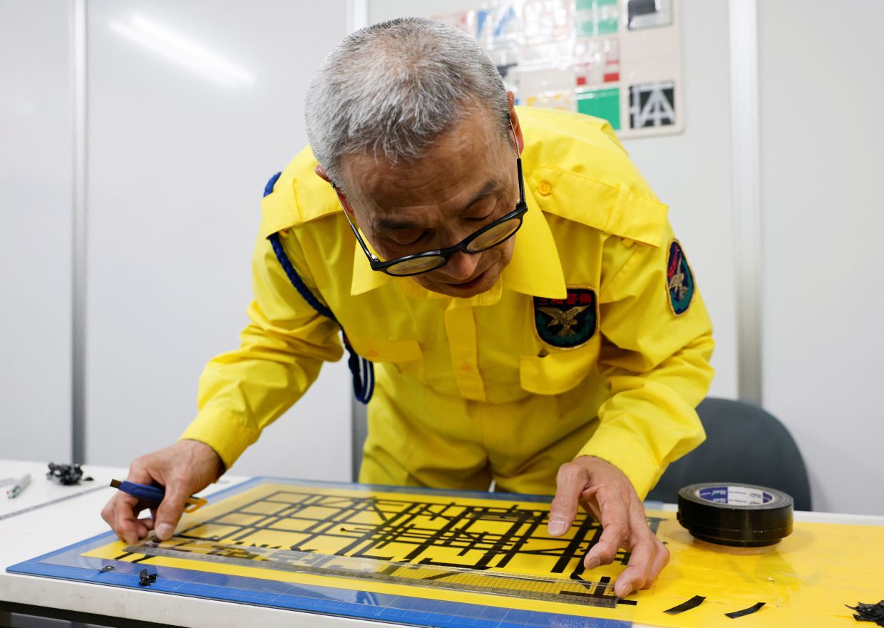 For all his work's popularity, Sato has never charged a set fee, leaving compensation up to his clients. Photo: Reuters 